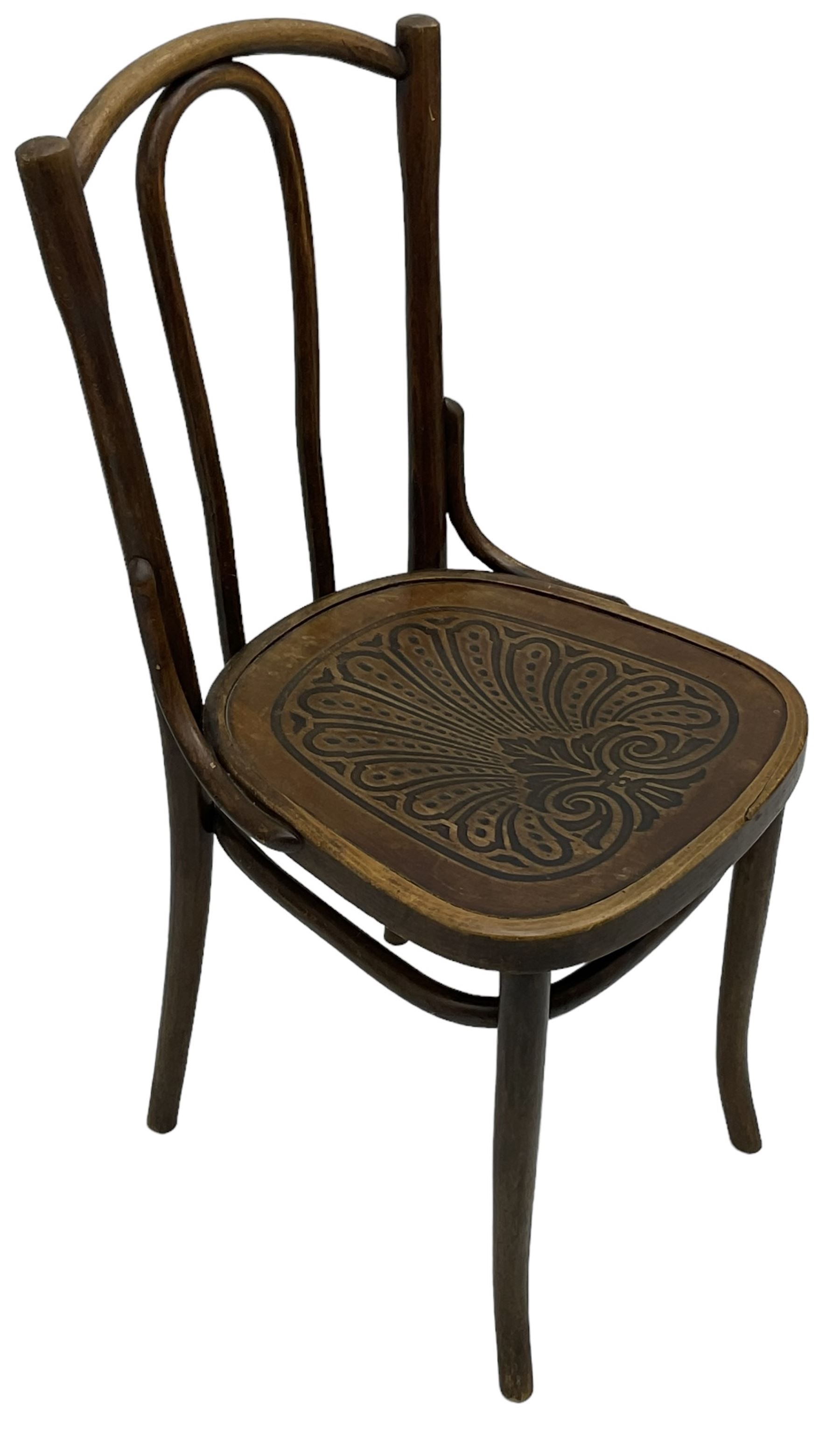 Set of three late 19th to early 20th century century bentwood dining chairs, the seats with pressed anthemion decoration, circa. 1900s