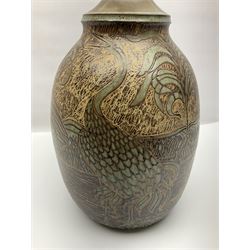 John Egerton (c1945-): studio pottery stoneware lamp base, decorated with cranes in a riverscape upon a mottled brown ground, H51cm