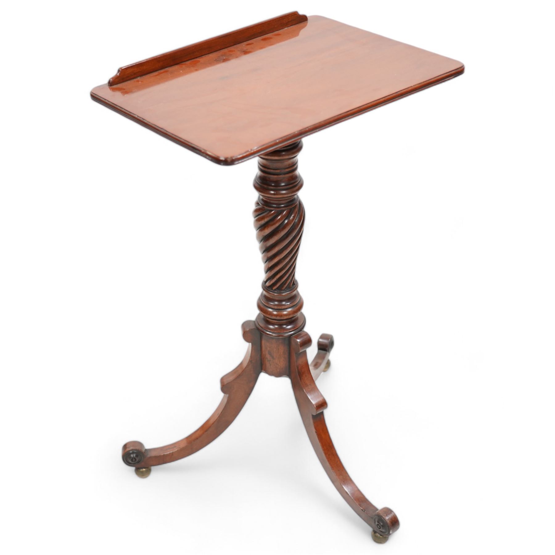 Early 19th century mahogany reading stand, moulded rectangular adjustable top with removable rest, on turned spiral vasiform pedestal with three out splayed supports, applied turned roundels, on brass globular feet