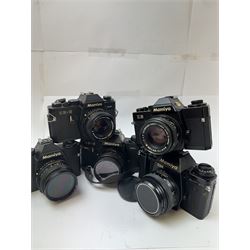 Five Mamiya SLR camera bodies, to include two ZE examples, serial nos. N171962 & N101512, one with a Mamiya-Sekor E 1:1.7 f-50mm lens serial no. 73984, the other with a Mamiya-Sekor E 1:2 f=50mm lens serial no. 48130, two ZE-2 camera bodies serial nos. N10753 & N328146, one with a Mamiya-Sekor E 1:1.7 f-50mm lens serial no. 93361 the other with a Mamiya-Sekor E 1:2 f=50mm lens serial no. 40170 and a ZM camera body serial no. V206108, with a Mamiya-Sekor E 50mm 1:1.7 S lens