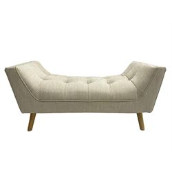 Contemporary U-shaped window or bed stool, upholstered in buttoned neutral fabric