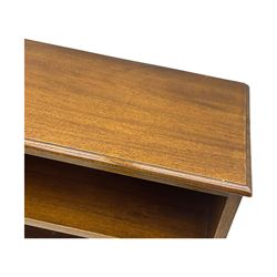 20th century mahogany open bookcase, fitted with two shelves, on bracket feet