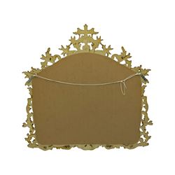 Rococo design gilt framed wall mirror, shaped moulded frame decorated with flower heads and scrolling foliage, plain mirror plate 