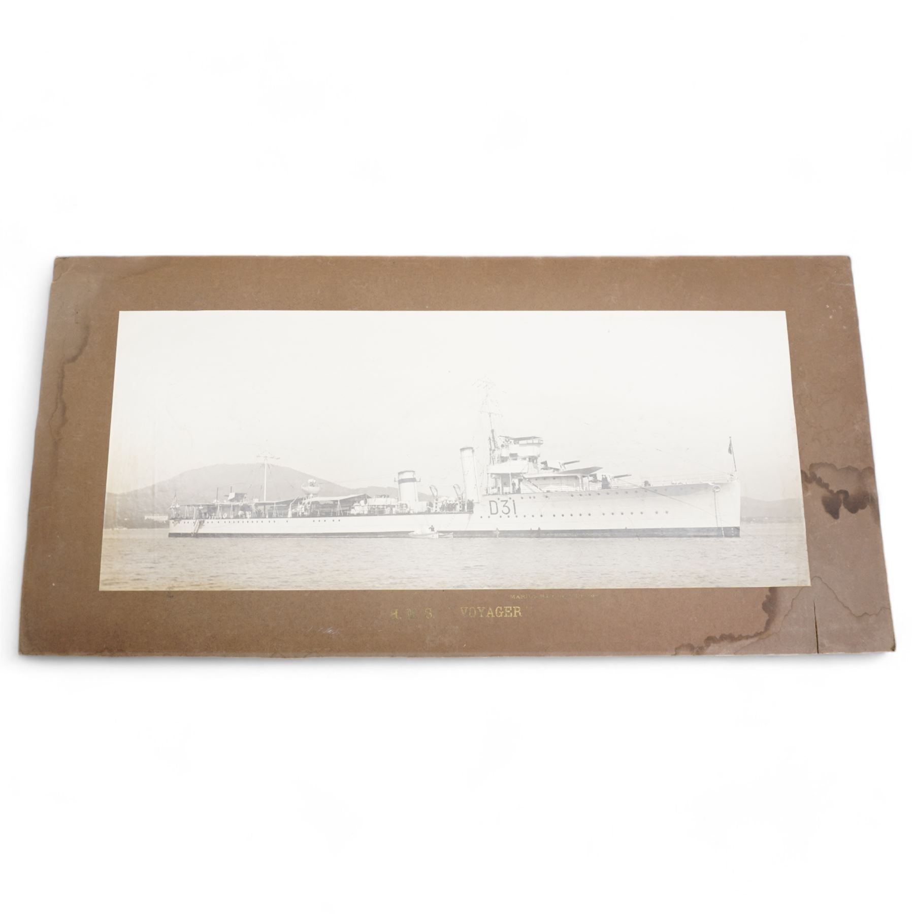 Pair of photographs of H.M.S. Vendetta and H.M.S. Voyager by Marius Bar, Toulon 23cm x 57cm, various military photographs and a number of A.R.P. and  Civil Defence badges 1939-45, framed