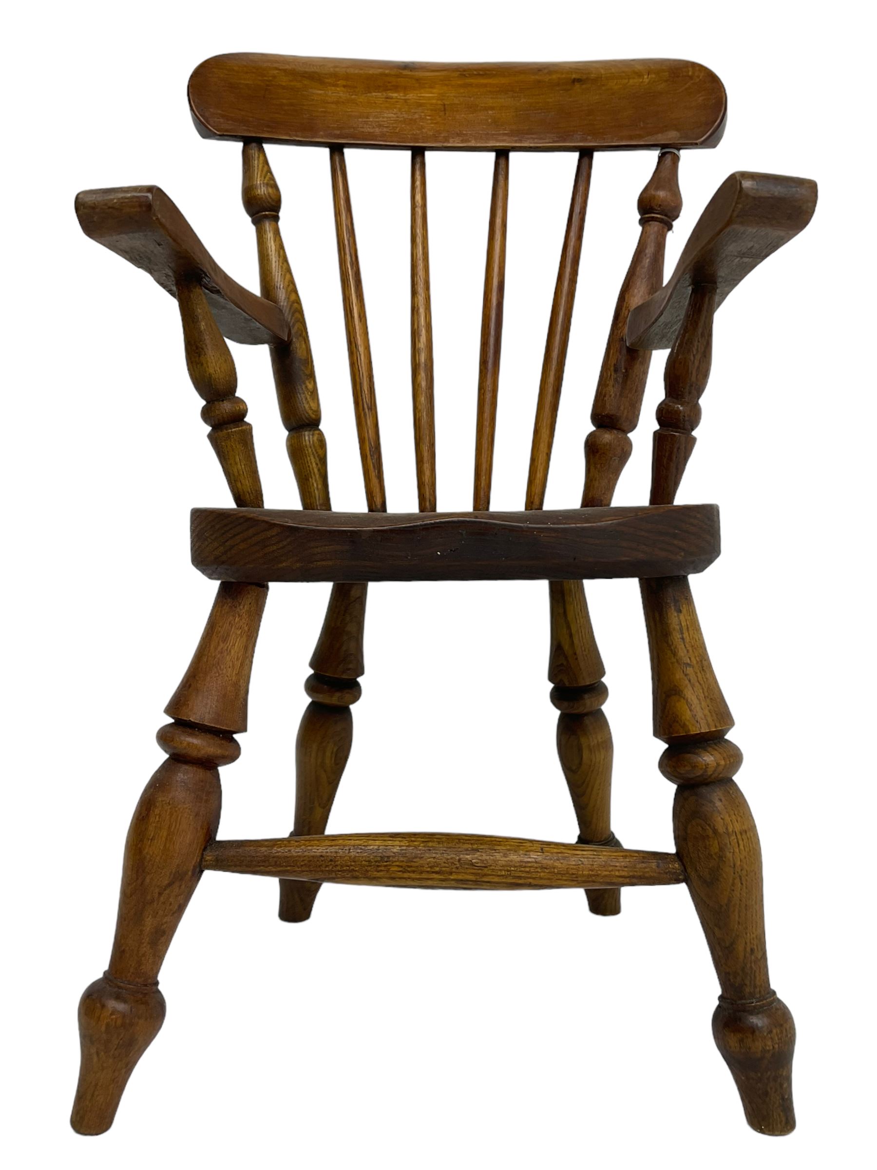 19th century elm and beech child's farmhouse chair, shaped cresting rail over stick back, on turned supports 