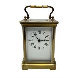 French-Late 19th century 8-day timepiece carriage clock in a corniche case, with a white e...