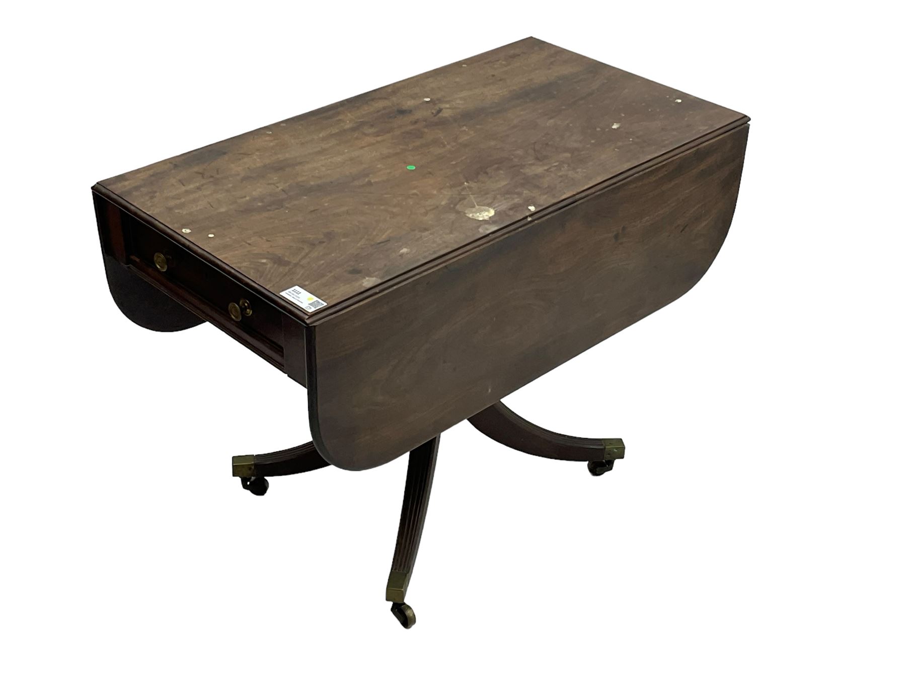 George III mahogany Pembroke table, moulded rectangular drop-leaf top with rounded corners, fitted with single cock-beaded end drawer, on turned pedestal with four reed moulded supports, brass cups and castors 