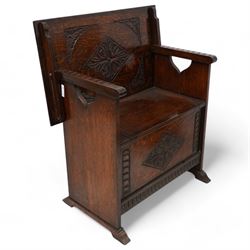 Early-to-mid-20th century carved oak monk's bench, metamorphic top with foliate lozenge carvings, over box seat with hinged lid, arcade carved lower rail on shaped feet