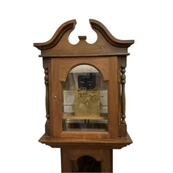 20th century grandmother clock with a weight driven movement