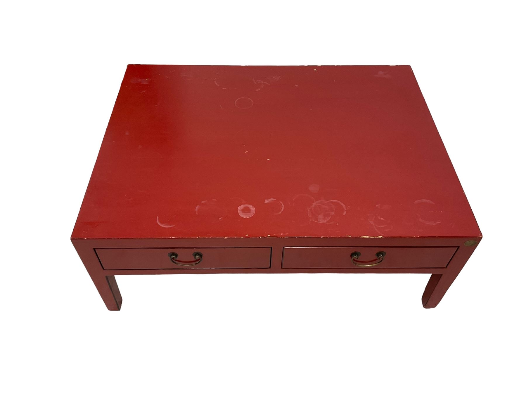 Chinese design red lacquered coffee table, rectangular form on square tapering supports, fitted with two drawers 