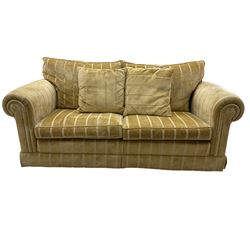 Duresta England - two-seat sofa, upholstered in pale gold fabric, traditional shape with rolled arms