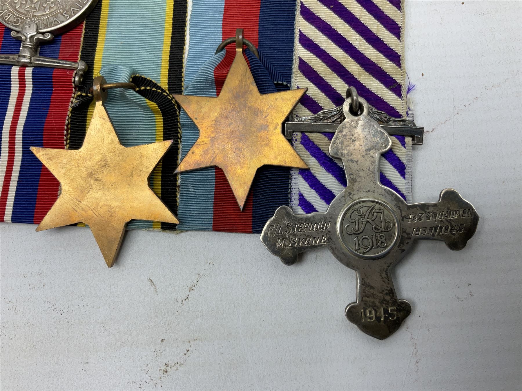 WW2 Royal Canadian Air Force group of five medals comprising Distinguished Flying Cross inscribed verso 1945 F/L Stephen M. Byrne 433 Squadron 1939/1945, 1939-1945 Star, Air Crew Europe Star, 1939-1945 War Medal and Canadian Volunteer Service Medal with maple leaf clasp; together with copies of research material including London Gazette Supplement