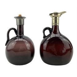 Late 19th/ early 29th century Continental ruby glass claret jug with white metal hinged cover H20cm and an amethyst glass claret jug H19cm (2)