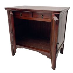 Pair of early 20th century Chinese red lacquered elm storage cupboards, rectangular top over two panelled doors, fitted with two internal drawers, on square supports with curved outer edge, panelled sides