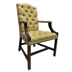 Georgian design mahogany framed Gainsborough open armchair, upholstered in pale gold buttoned fabric with floral pattern, on square moulded supports united by plain stretchers 