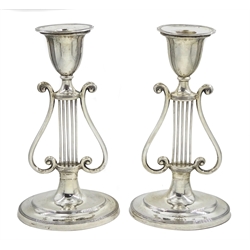 Pair of Edwardian silver stylised harp candlesticks by Sibray, Hall & Co Ltd, London 1911, H19.5cm