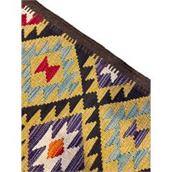 Chobi Kilim multi-colour runner rug, the field decorated with geometric lozenges in contrasting shades on brown ground