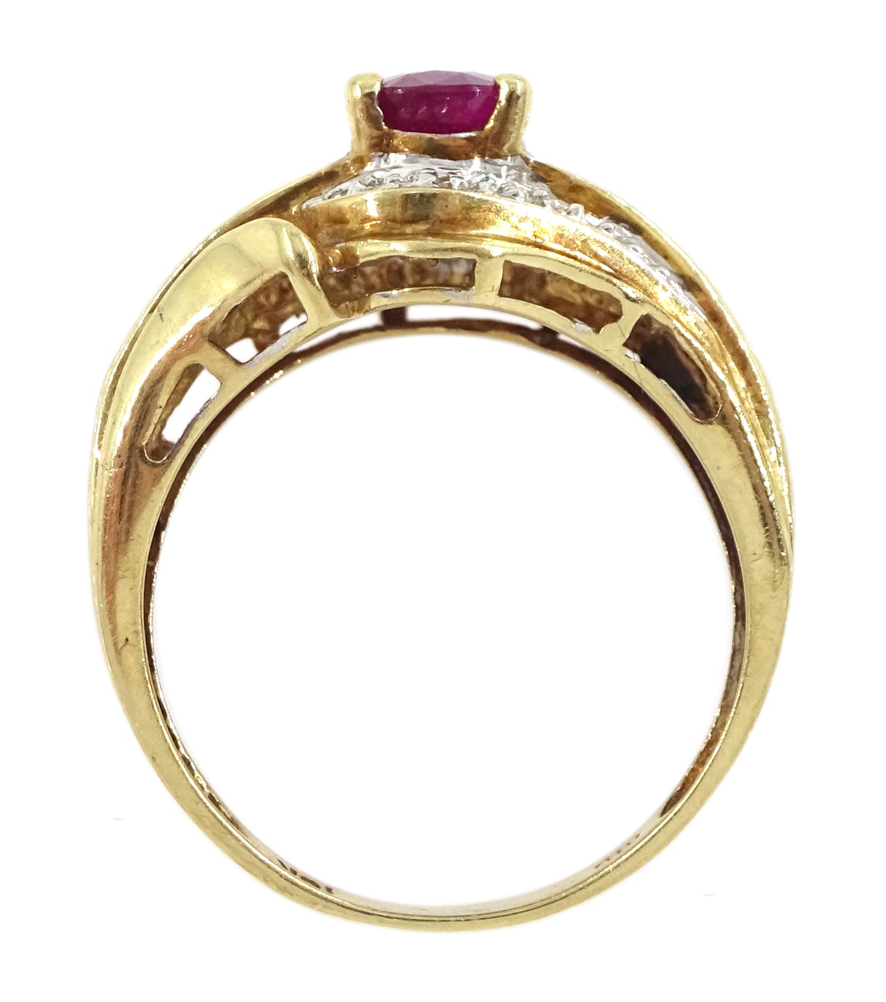 Gold ruby and diamond cluster ring, stamped 10K