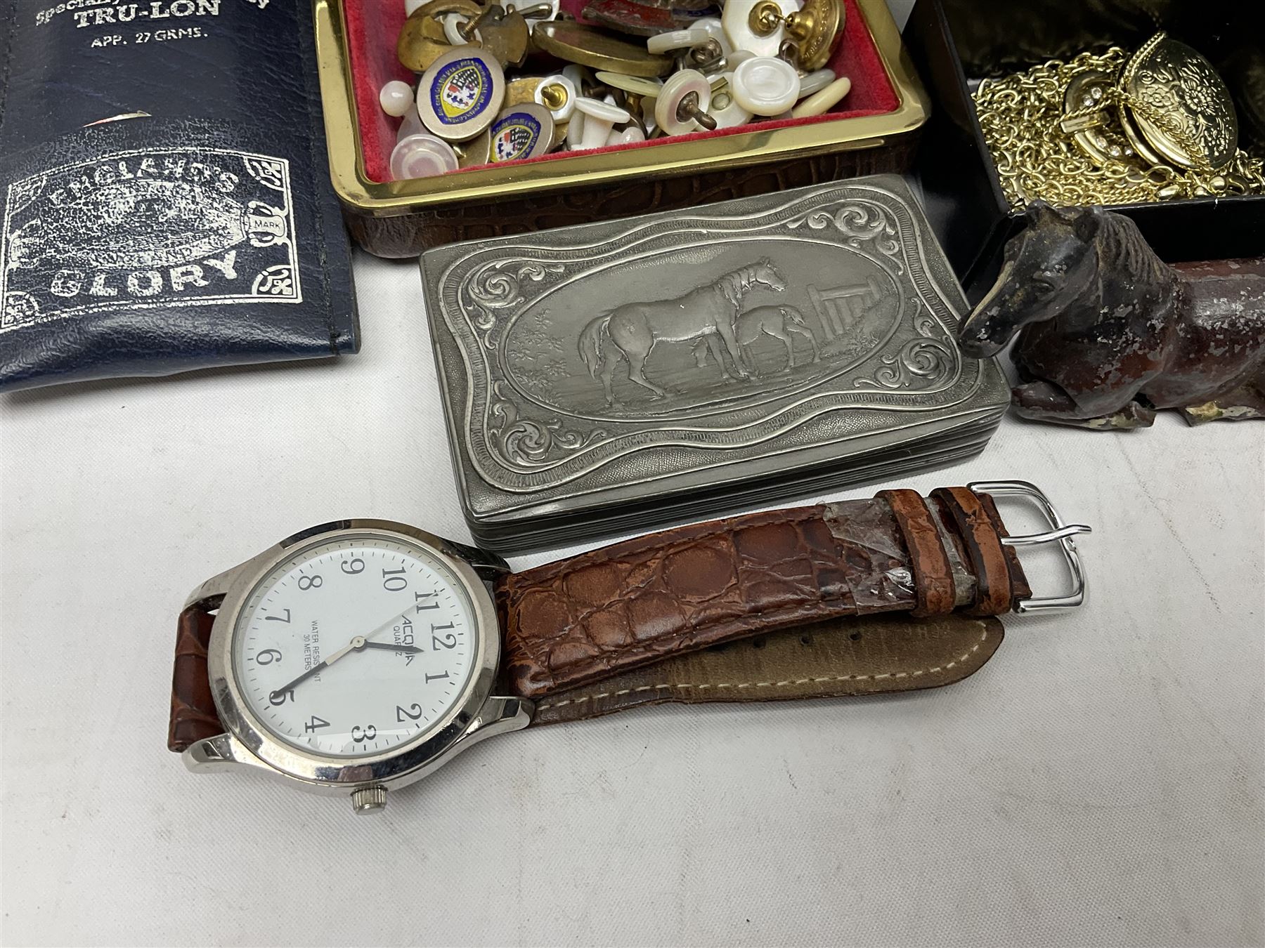 Silver brooch and a collection of costume jewellery, together with ceramic trinket box, foldable photograph frame and other collectables