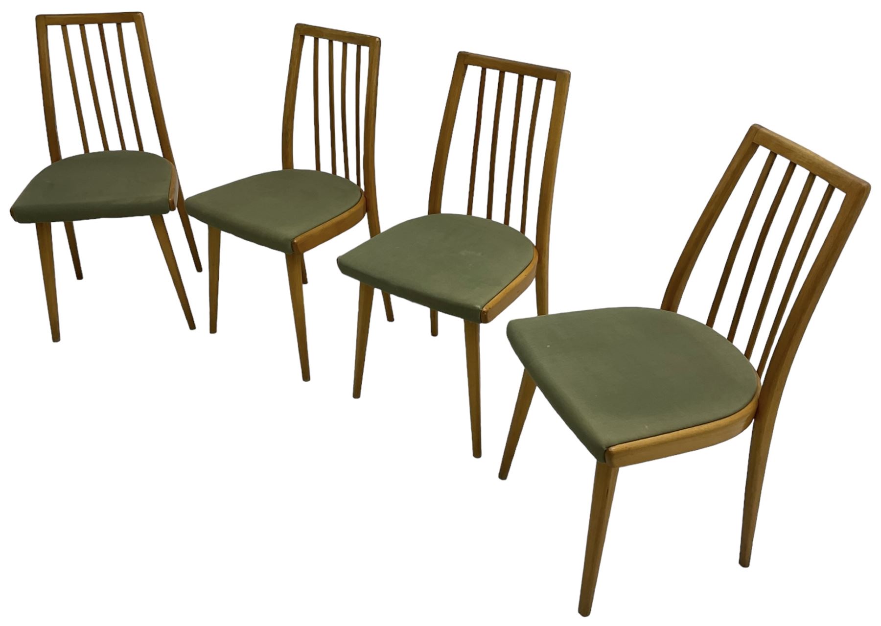 Set of four mid-20th century beech framed dining chairs, vertical slat back over upholstered seats, on tapering supports