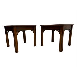 20th century pair of yew wood lamp tables, moulded square top with pierced corner brackets, on fluted straight supports 