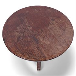 George III mahogany tripod table, circular tilt-top on ring turned gun barrel pedestal, on three out-splayed supports 