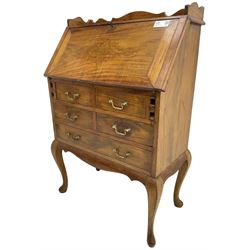 Inlaid hardwood bureau, shaped raised back over fall front inlaid with brass scrollwork, four short over one long drawer, on cabriole supports  