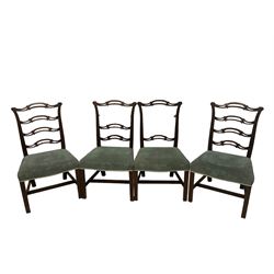 Set of twelve (10+2) Chippendale revival stained beech dining chairs, pierced waived ladder backs with over-stuffed over seats, on square moulded supports joined by stretchers