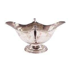 Edwardian silver twin handled pedestal dish, of navette shaped form, with twin loop handles, upon a stepped oval pedestal, hallmarked William Neale, Birmingham 1907, H9cm