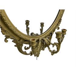 19th century giltwood and gesso girandole wall mirror, the raised pediment decorated with ribbon tie over curled acanthus leaves and flowerhead festoons, oval egg and dart moulded frame with outer bead, three projecting candle sconces in the form of scrolled acanthus leaves, lower shell motif with extending leaf decoration 