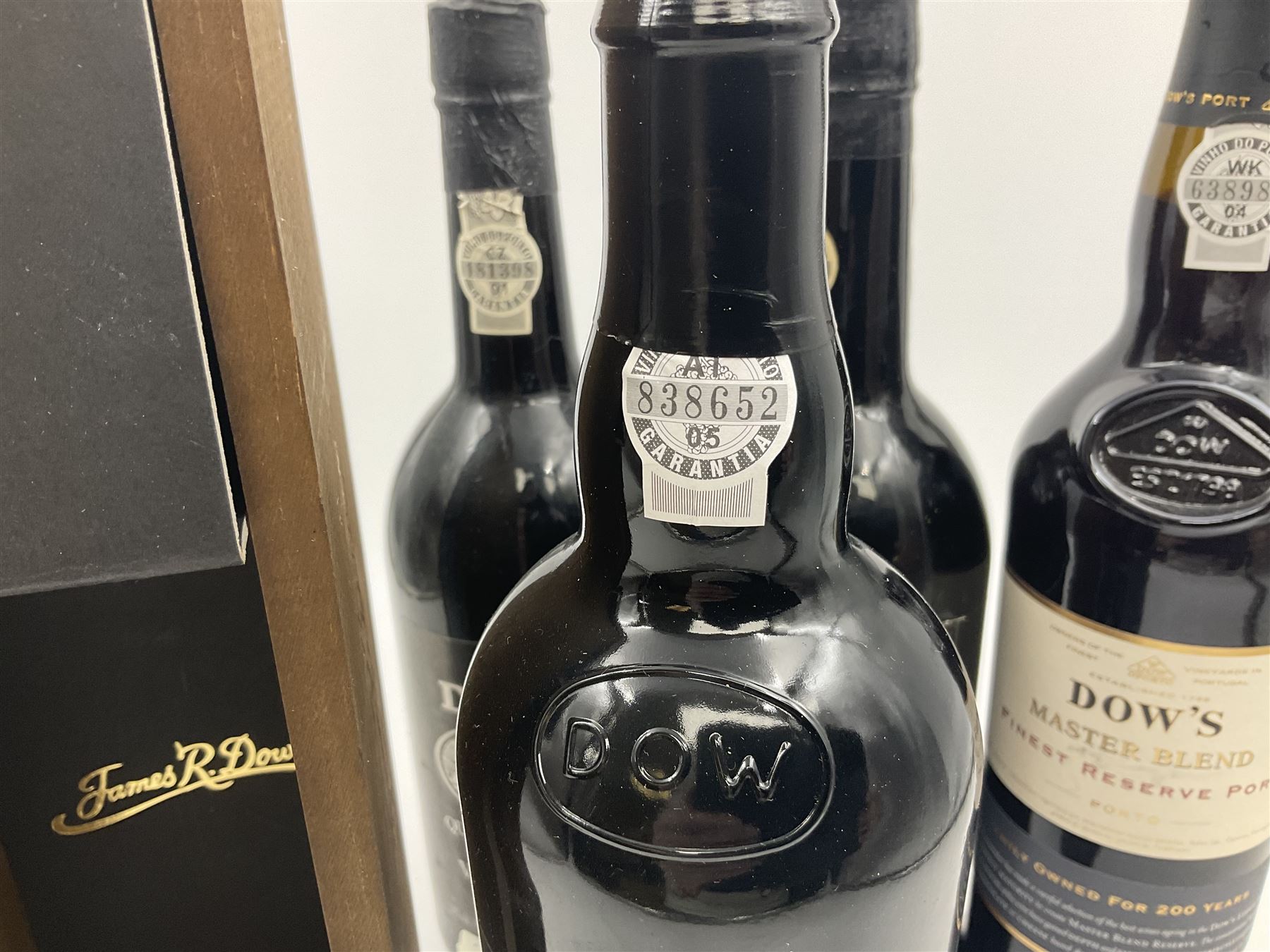 Four bottles Dow's port, comprising, 1975, 1979, Master Blend, and 2001 Quinta Do Bomfim, various contents and proof (4) 