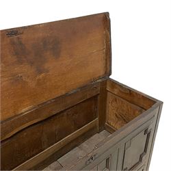 18th century oak mule chest, rectangular hinged top with moulded edge enclosing candle box, the triple panelled front with geometric fielded mouldings, fitted with single drawer to base, raised on stile feet