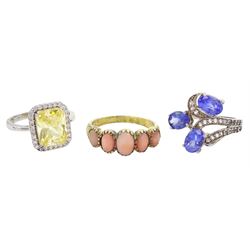 Silver-gilt five stone coral ring, silver tanzanite ring and one other silver stone set ring