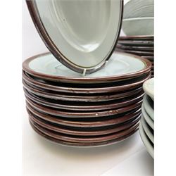 20th century celadon dinner service with iron rim, comprising nineteen dinner plates 26.5cm, twenty-four side plates D24cm, twelve varying bowls, twenty-two tea plates and fifteen saucers 