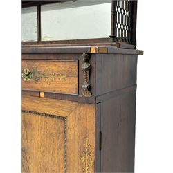 Attributed to John McLean & Son (London: 1770-1825) - Regency rosewood chiffonier, the raised two tier mirrored back on turned brass supports with brass trestle sides, rectangular top with brass stringing over two drawers and central cast brass satyr mask, cock-beaded drawer fronts inlaid with extending stylised foliate brass work, double cupboard below enclosed by panelled doors with cast egg and dart edging, matched brass inlays to the uprights, fitted with internal shelf, on turned compressed bun feet 