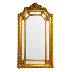 Victorian design gilt composition wall mirror, shell pediment decorated with trailing flow...