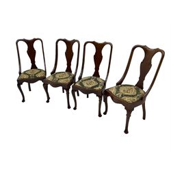 Set of eight late 19th century mahogany spoon back dining chairs, each with shaped top rail over Queen Anne design vase-shaped splat, upholstered seats in floral patterned fabric, raised on cabriole supports with scroll carved knees