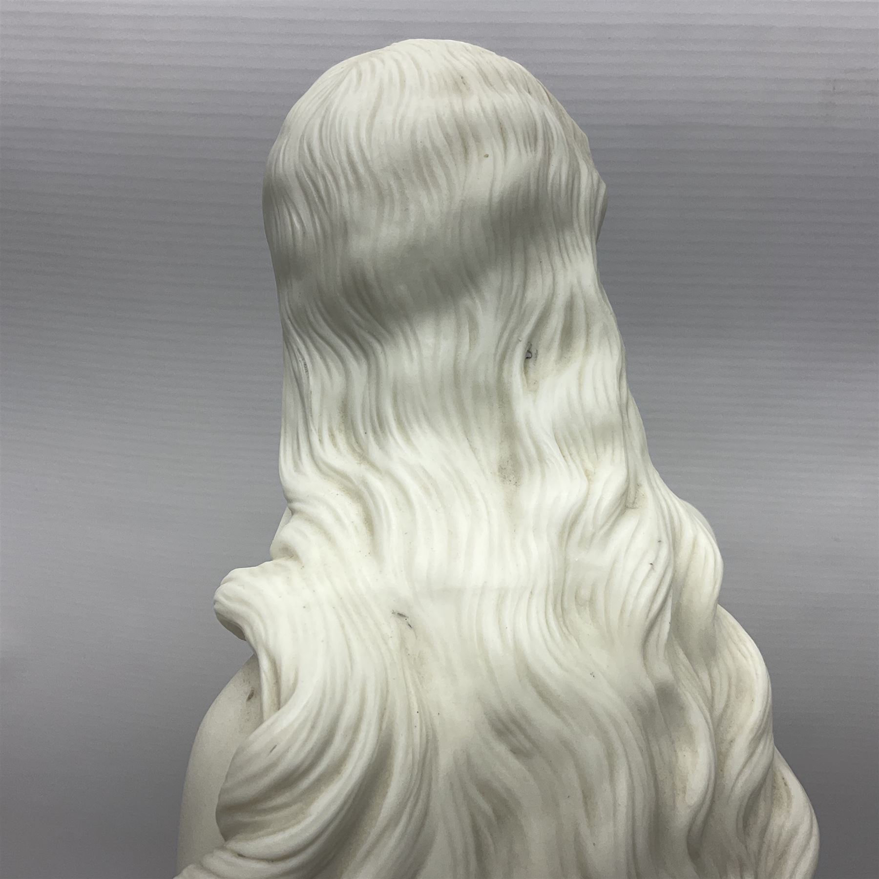 19th century Copeland Parian Ware figure, after R Monti, modelled as Lady Godiva, upon a circular titled plinth, signed and dated verso R Monti 1870, impressed to base Copyright Reserved Copeland, overall H22cm