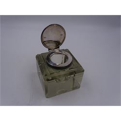 Edwardian silver mounted glass inkwell, the faceted square glass body with inset pen rests and silver collar and cover, hallmarked John Collard Vickery, London 1901, H7.5cm