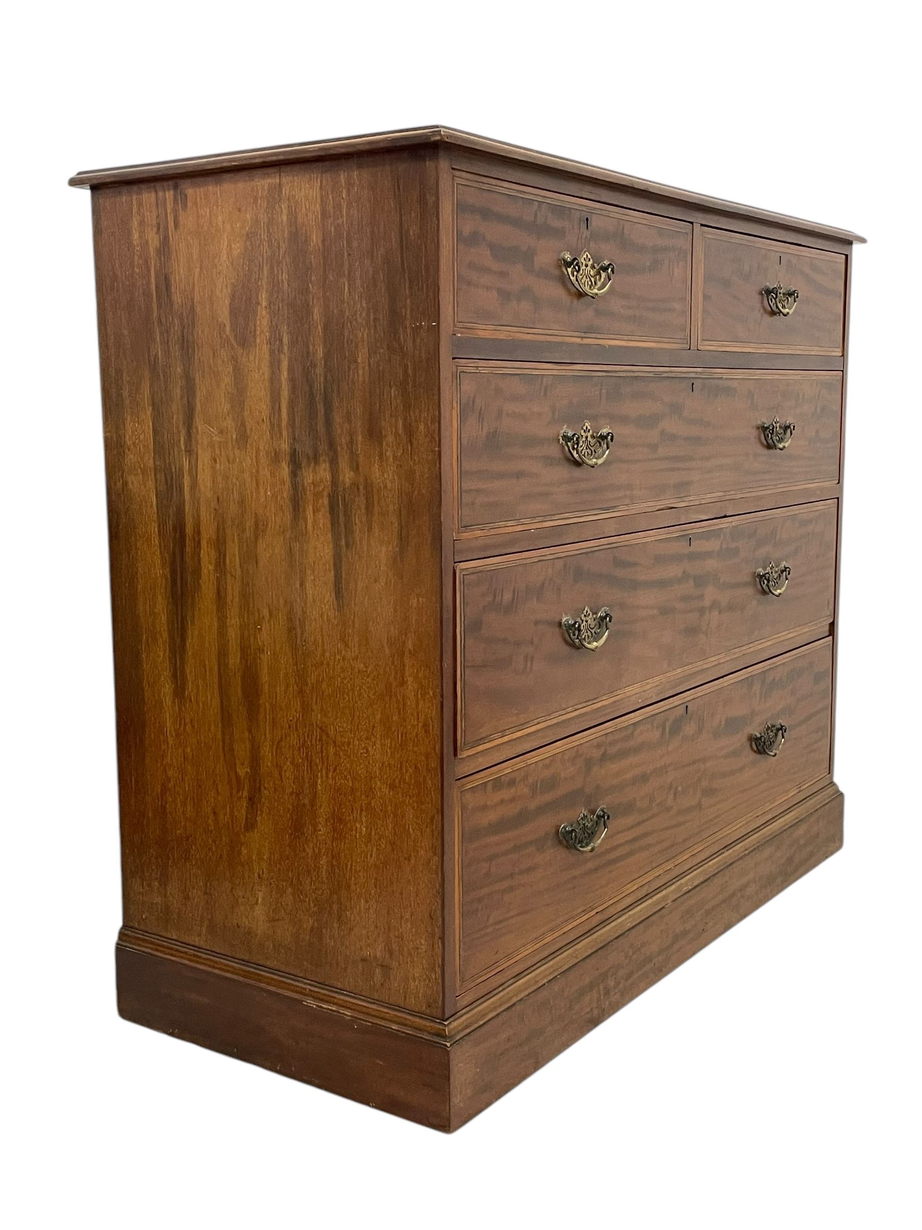 Late Victorian mahogany chest, moulded rectangular top over two short and three long graduating drawers, the drawer fronts inlaid with satinwood bands, boxwood and ebony stringing, on moulded plinth base 