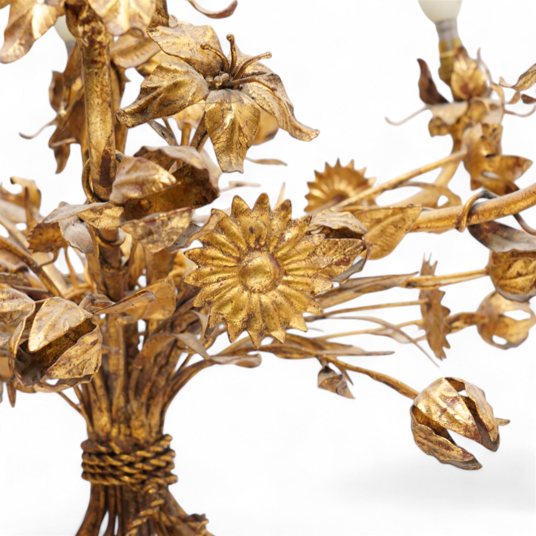 Late 20th century repousse gilt metal work chandelier, five projecting branches, decorated with trailing leafy branches and flower heads 