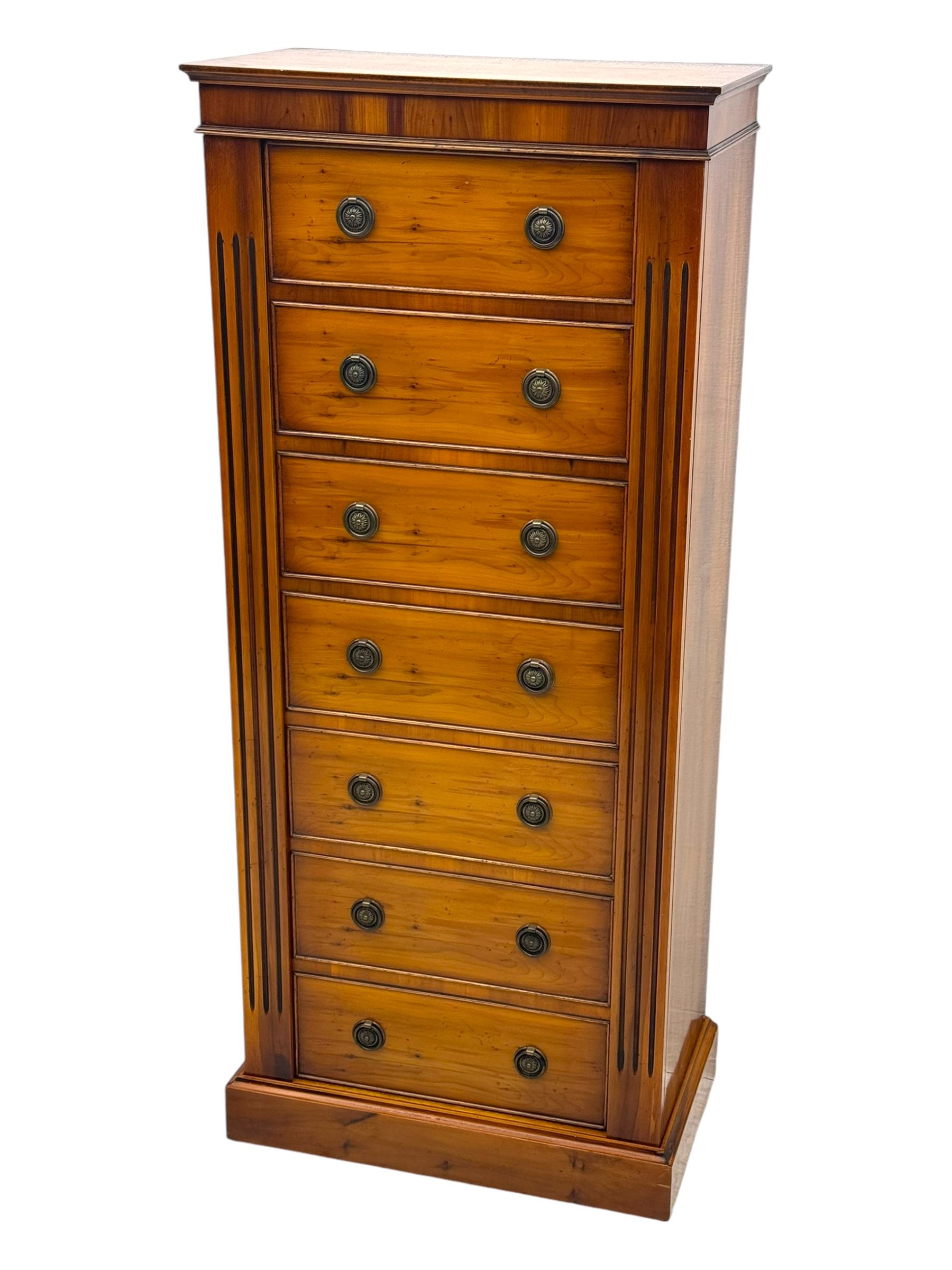 21st century steel lined gun cabinet, modelled as a Wellington chest of yew wood, to hold six long guns, interior lined with green baize, three storage shelves, with keys and bolts 