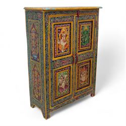 Indian painted hardwood storage cupboard, with painted floral decoration, enclosed by two panelled doors, the interior fitted with one shelf 