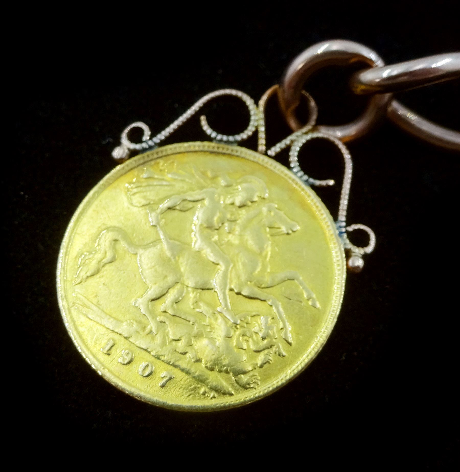 Early 20th century 9ct rose gold Albert chain, each link stamped 9. 375, by Herbert Bushell & Son Ltd, Birmingham, with a soldered King Edward VIII 1907 gold half sovereign coin