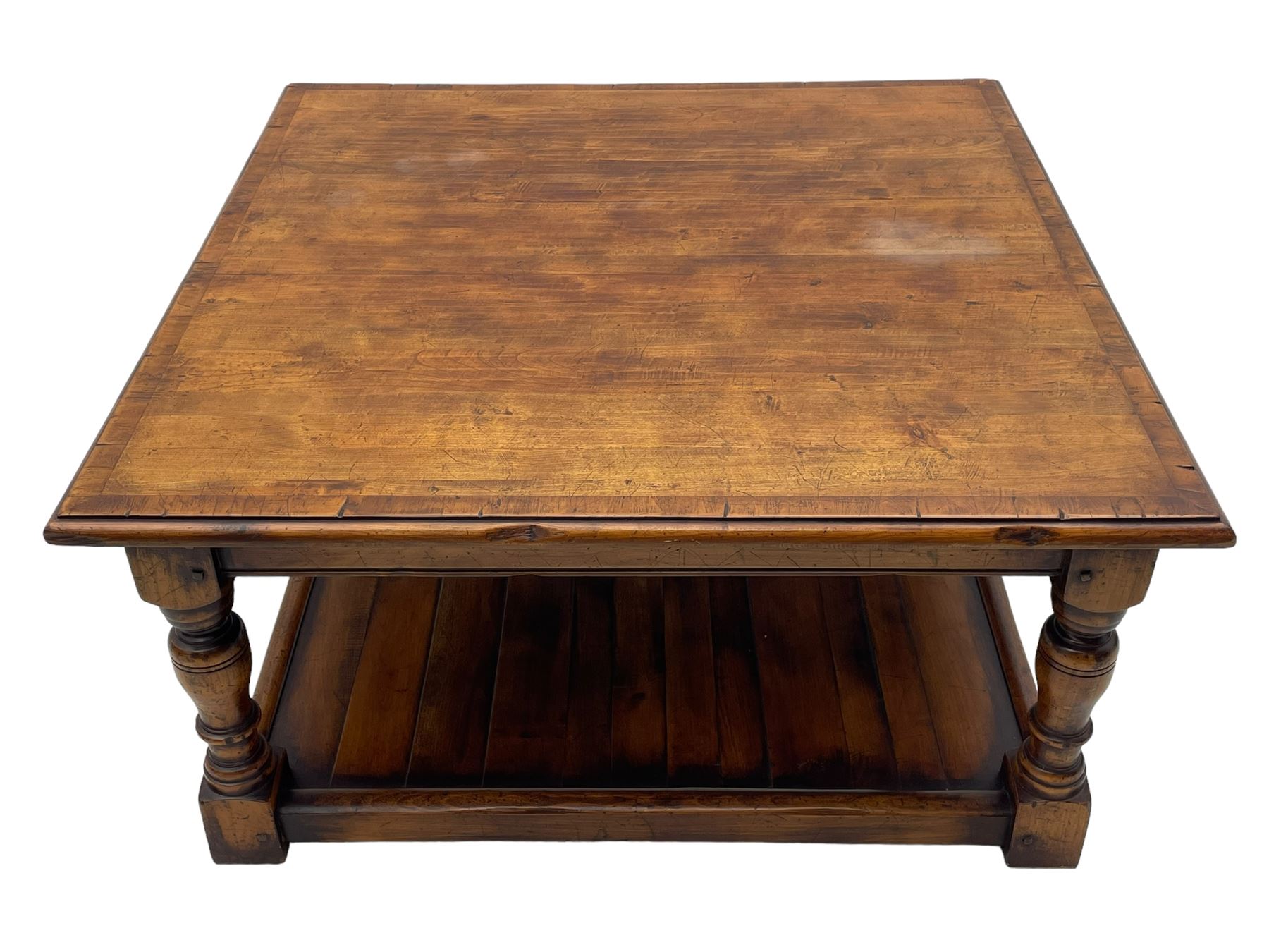 Square elm coffee table, square ovolo-moulded top with fruitwood band, turned supports united by undertier 