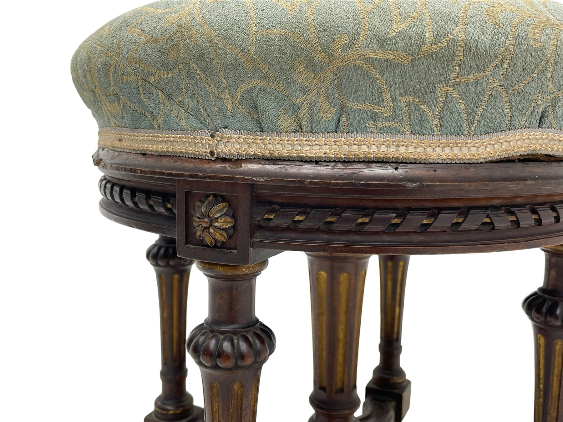 Holland & Sons (London: 1843-1942) - mid-to-late 19th century French design stool, circular form with upholstered cushioned seat in foliate pattern fabric, on lobe carved turned and fluted supports united by shaped X-framed lower stretchers 