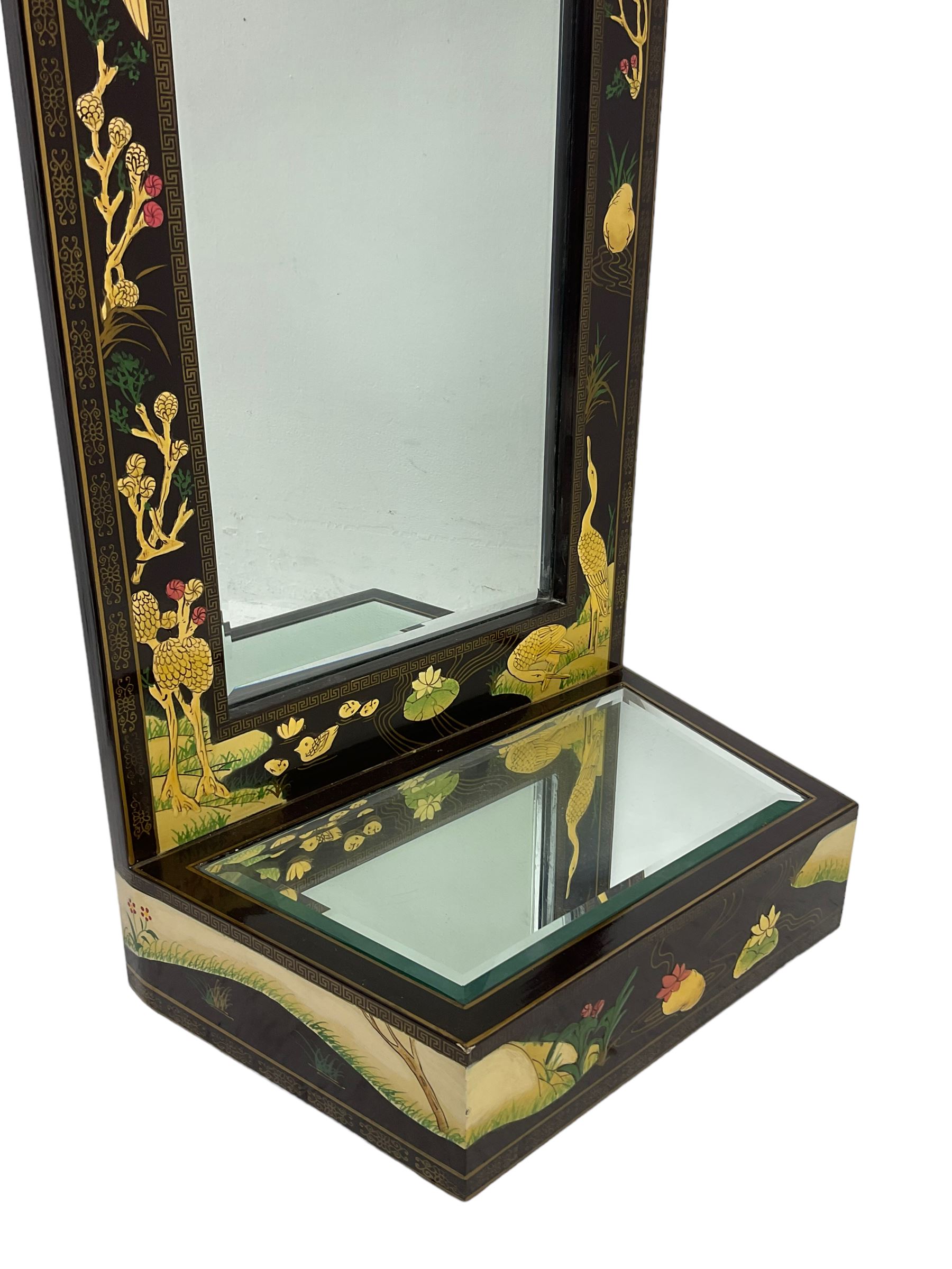 Chinoiserie design wall hanging mirror with shelf, the rectangular frame with raised decoration depicting birds and landscapes, fitted with bevelled glass 