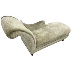 Contemporary chaise longue with scrolled back, upholstered in champagne crushed velvet, on turned feet