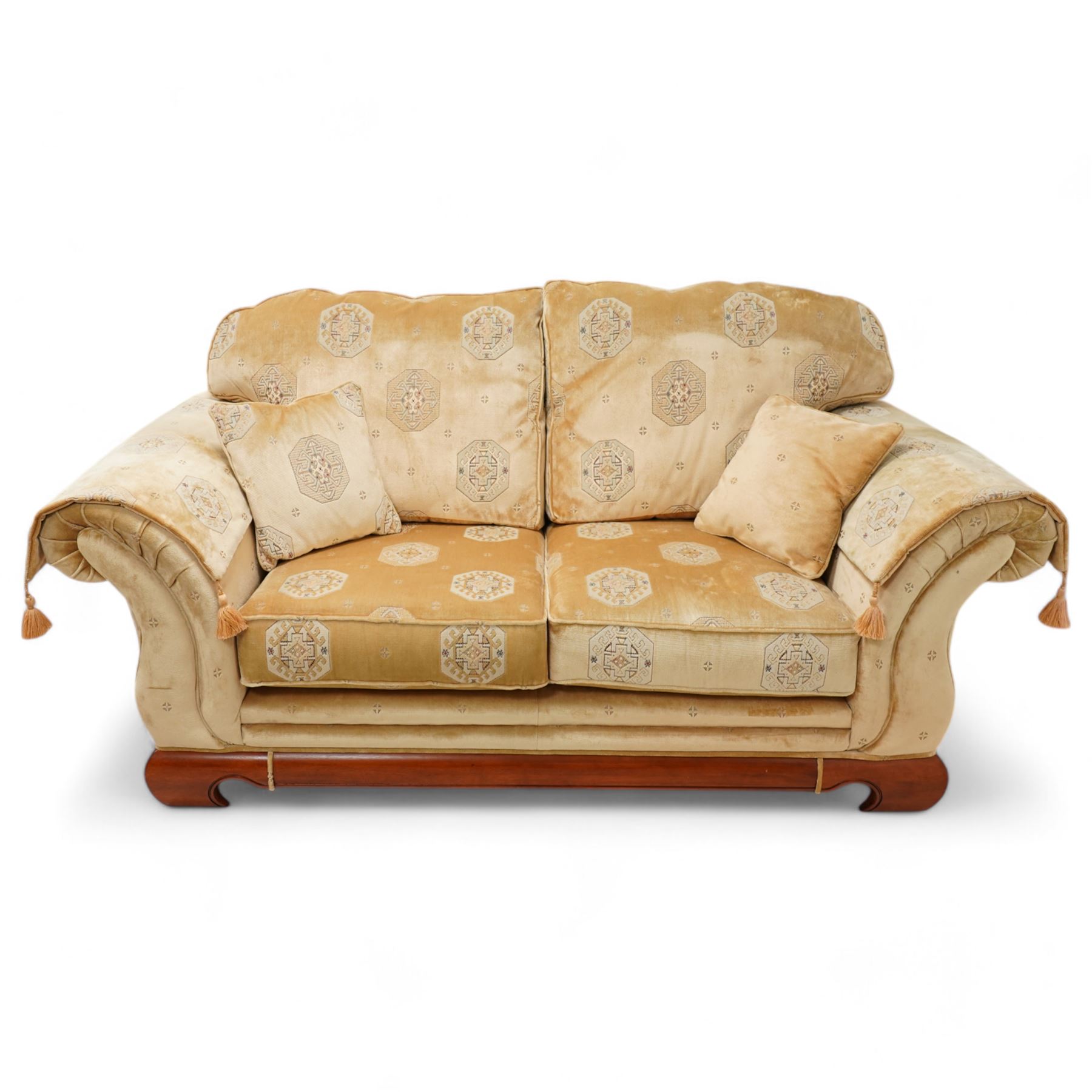 Three-seat sofa (W197cm, D103cm) and pair of matching armchairs (W100cm); upholstered in pale gold fabric decorated with Gul motifs, hardwood framed with polished base