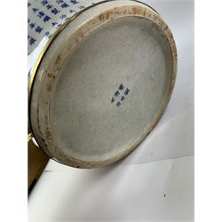 Large Oriental design ginger jar and cover, of squat baluster form with domed cover, decorated in blue with Chinese characters against a white crackle glaze ground, the cover, neck and foot rim with applied brass band, with character mark beneath, H43cm